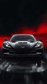 Black Corvette supercar charging through red-lit night.