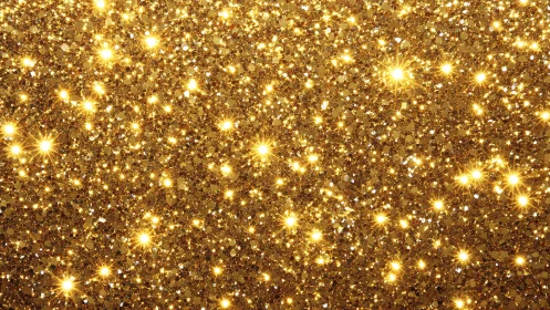 Gold glitter surface with bright sparkling light points.