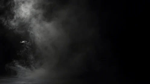 Diffuse smoke plume occupies left side against dark void