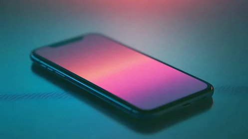 Smartphone with Gradient Display Against Teal Ambient Surface.