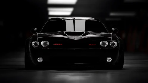 Front view shows black performance coupe in low-key tunnel lighting