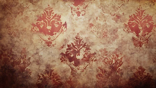 Warm vintage damask wall with softly faded red patterns.