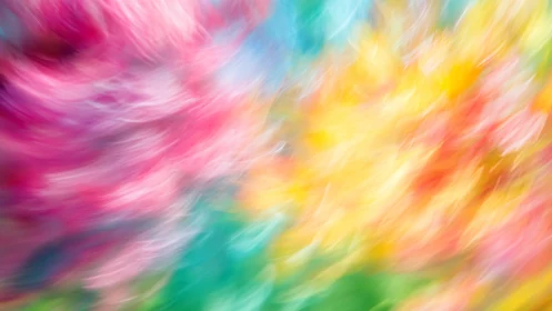 Vibrant abstract color waves create a dreamy, kinetic blur
