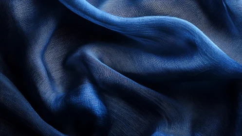 Soft blue fabric folds create gentle waves of soothing calm