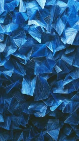 Blue crystalline polygonal surface with layered shard structure.