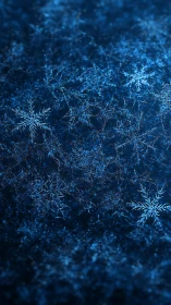 Macro crystalline snowflakes on deep blue frosted surface.