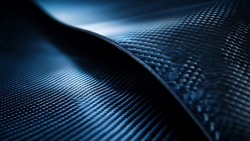 Carbon fiber waves glide like midnight metal oceans