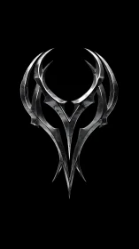 Chromed tribal sigil forms symmetrical metallic crest