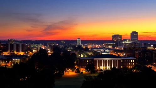 City skyline unwinds beneath a velvet evening sunrise glow.