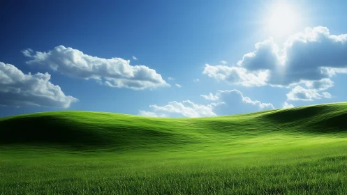 Sunlit green hills under clear blue sky with clouds.