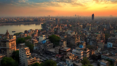 Dense urban riverfront skyline under layered sunset light.