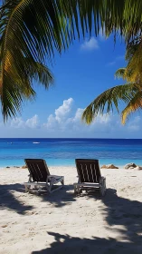Tropical Paradise Beach With Lounge Chairs Under Palm Fronds
