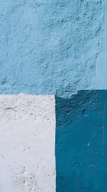 Calming blue and white wall blocks offer simple urban charm