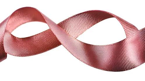 Rosy satin ribbon looping in a graceful midair dance.