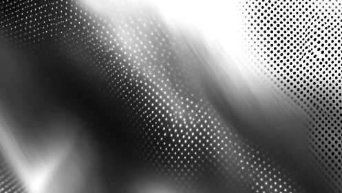 Monochrome diagonal halftone dots with glowing light band.