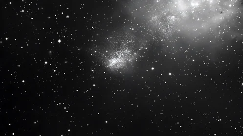 Dense star cluster glows inside monochrome galactic dust field