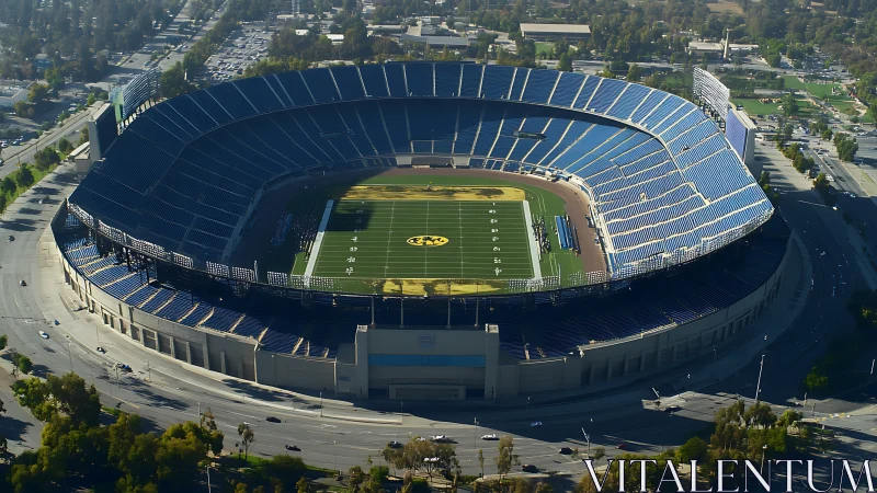 High-capacity open-air football stadium in aerial daylight view.