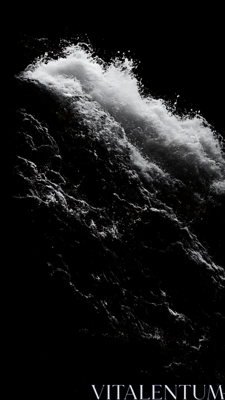 High contrast closeup of crashing waterfall in darkness.