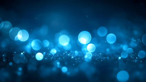 Abstract blue bokeh lights on dark background, digital style.