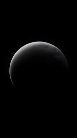 Quiet crescent world rests in gentle shadowed starlight