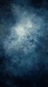 Nebulous indigo cloudscape with diffused central radiance.