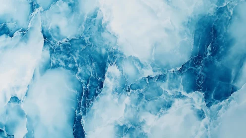 Abstract blue marble texture with icy tones and smooth gradients.