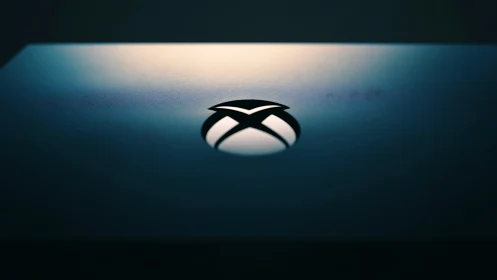 Xbox console surface displays centered embossed logo