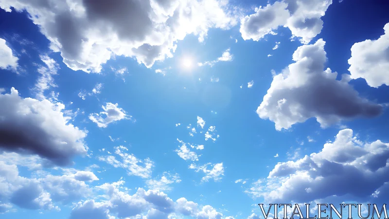 Sunlit cumulus cloudscape under deep saturated blue sky.