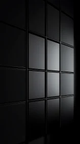 Sleek black wall panels glow softly in minimalist light
