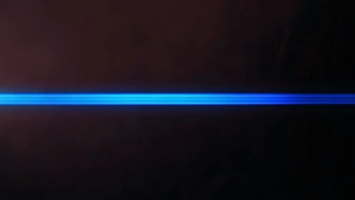 Luminous blue energy beam slicing through deep shadowed void.