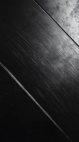 Dark scratched metal diagonal texture with subtle lighting.