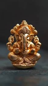 Golden Ganesha statue sits centered on dark textured surface