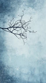 Minimalist winter branch intersects textured icy sky field