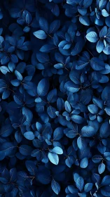 Monochromatic deep blue foliage pattern with directional top lighting