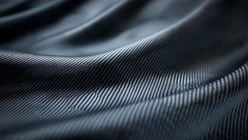 Carbon fiber textile shows detailed woven surface structure