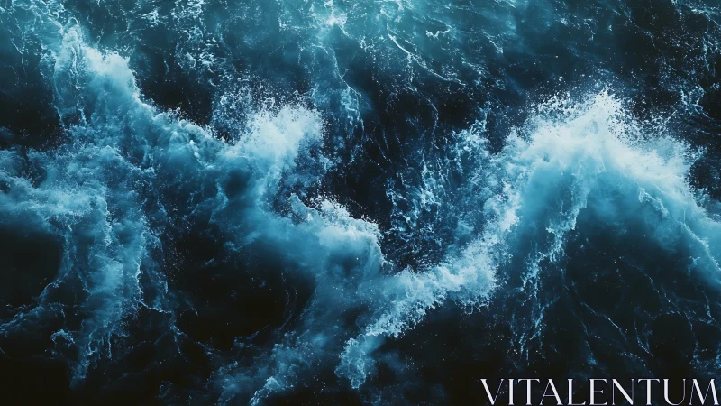 Roiling teal ocean waves in dramatic overhead motion study.