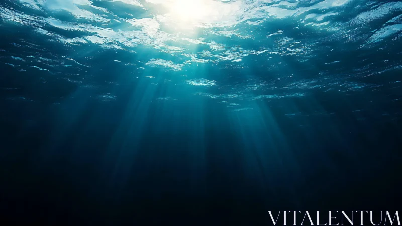 Sunlit ocean depths with cascading turquoise light rays.