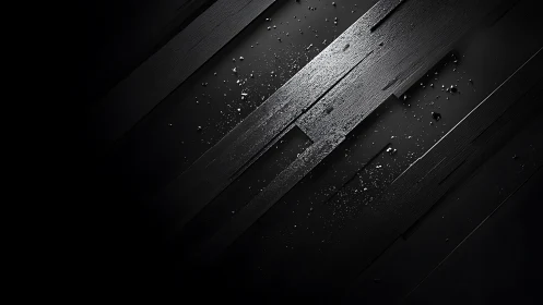 Shattered graphite streaks glide through velvet black silence