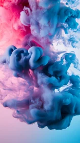 Colorful ink clouds merging in soft gradient light.