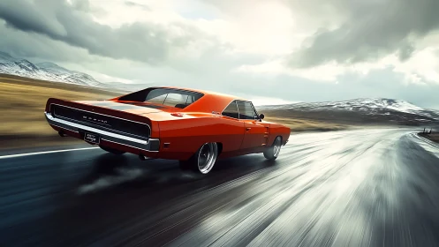 Classic orange muscle car on wet mountain highway at speed.