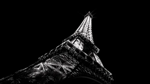 Steel lattice tower is shown from low angle in stark contrast