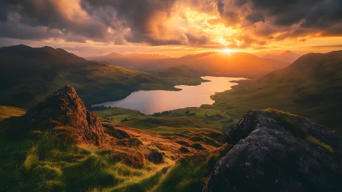 Sunset-illuminated highland valley with lake and cloud drama.