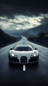 Supercar cuts wet mountain highway under storm sky.