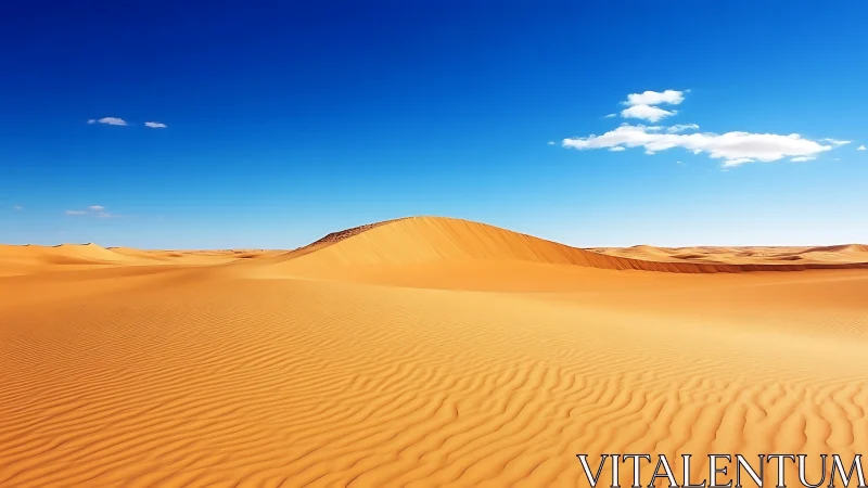 Golden desert dune under deep cobalt sky at midday.
