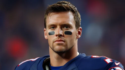 Calm and focused football player ready for game night.