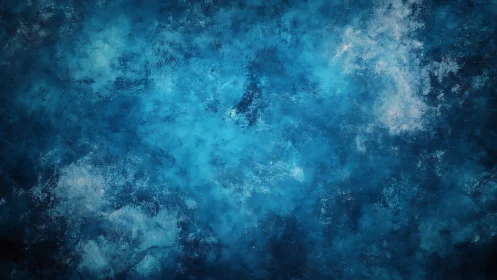 Textured blue abstract surface shows layered tonal variations