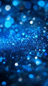 Blue bokeh lights create shimmering abstract depth field