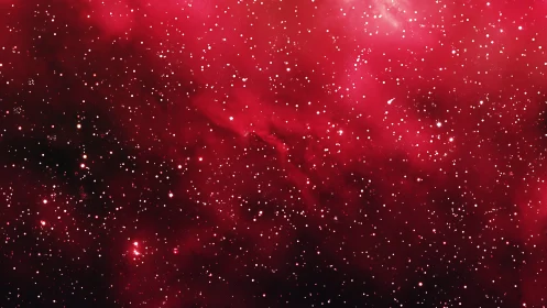 Stardust drifts like snowfall through a crimson cosmic fog