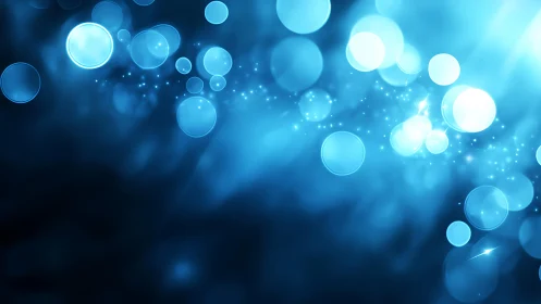 Abstract glowing blue bokeh lights on dark background, digital art.