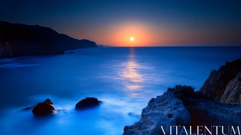 Long-exposure coastal sunset with smoothed surf and high contrast